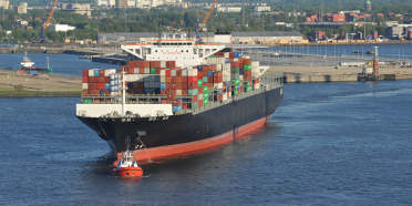 View of a ship carrying containers on the ocean