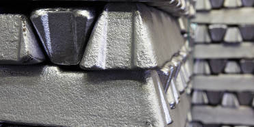 A stack of aluminum ingots to be sent to melting furnaces