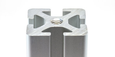 A T-slot aluminum extrusion with the profile side facing up