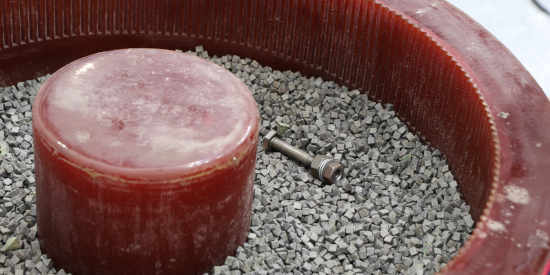 Vibratory barrel finishing machine close up