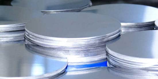 Aluminum circle blanks in a pile