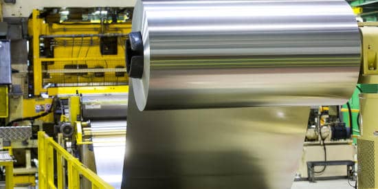 Rolled aluminum products being made in the factory