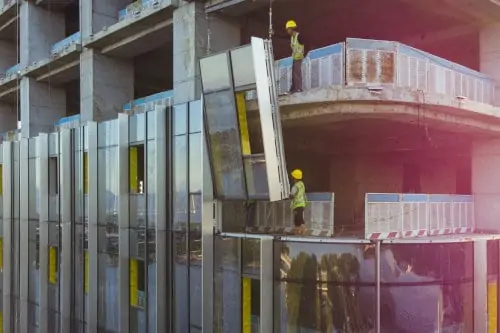 Aluminum curtain wall being installed on a building