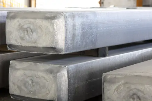 Aluminum slabs for use in the aluminum rolling process