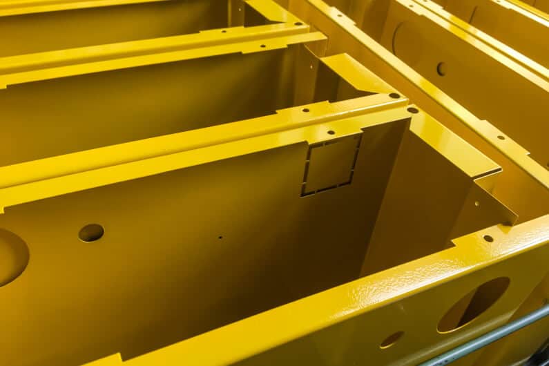 Yellow powder coated metal product