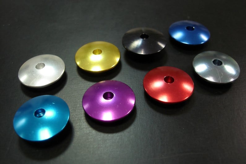 Blue, red , silver, gold, and purple anodized aluminum parts