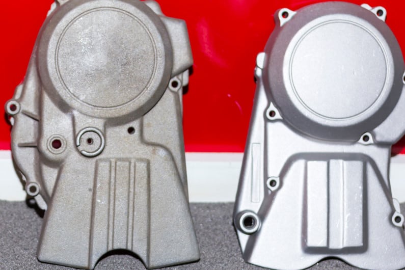 Aluminum castings before and after shot blasting
