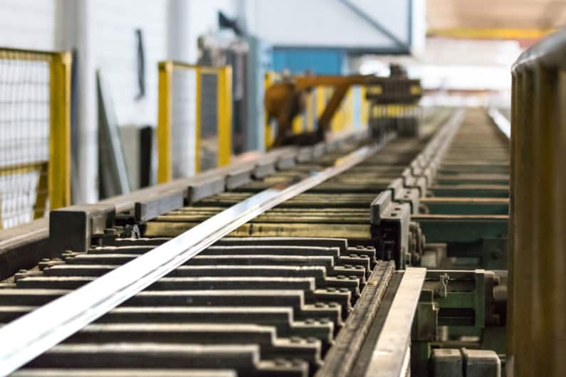 aluminum-extrusion-offerings-home Aluminum extrusion on run-out table
