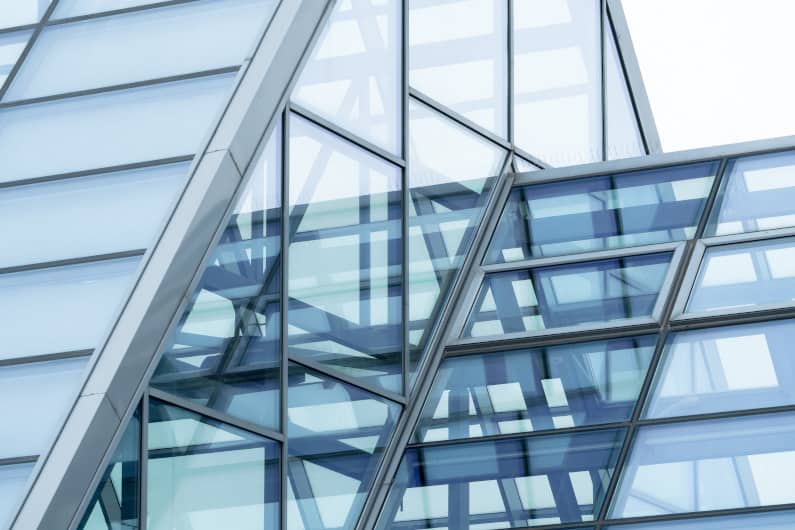 Aluminum structure supporting glass roof in  an office building.